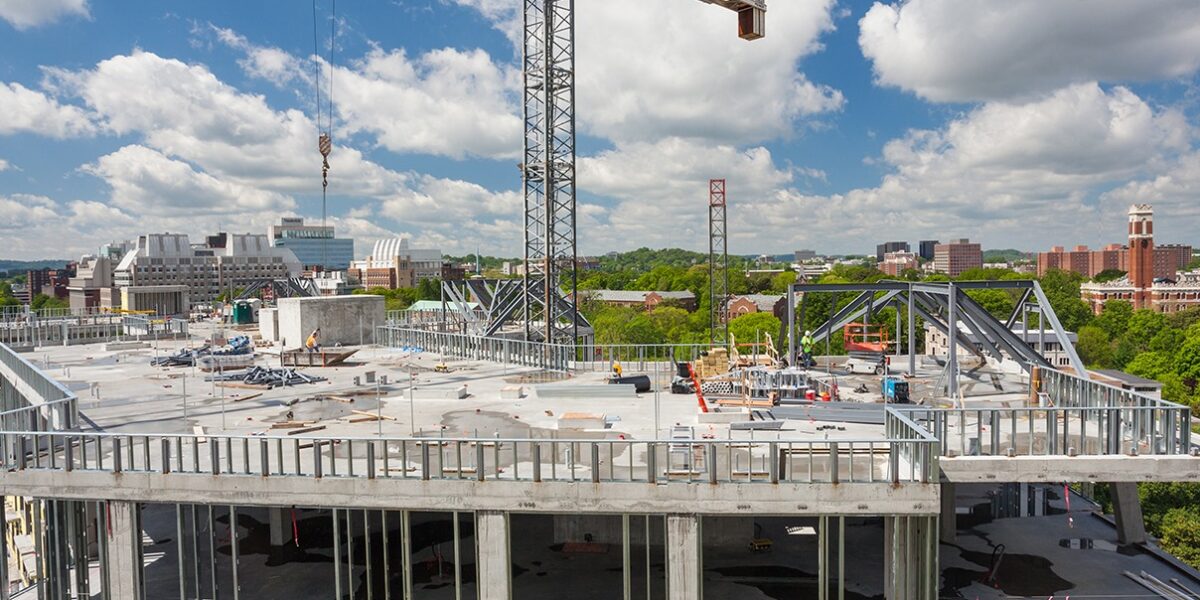 Crain Construction Aertson under construction with scaffolding and crains