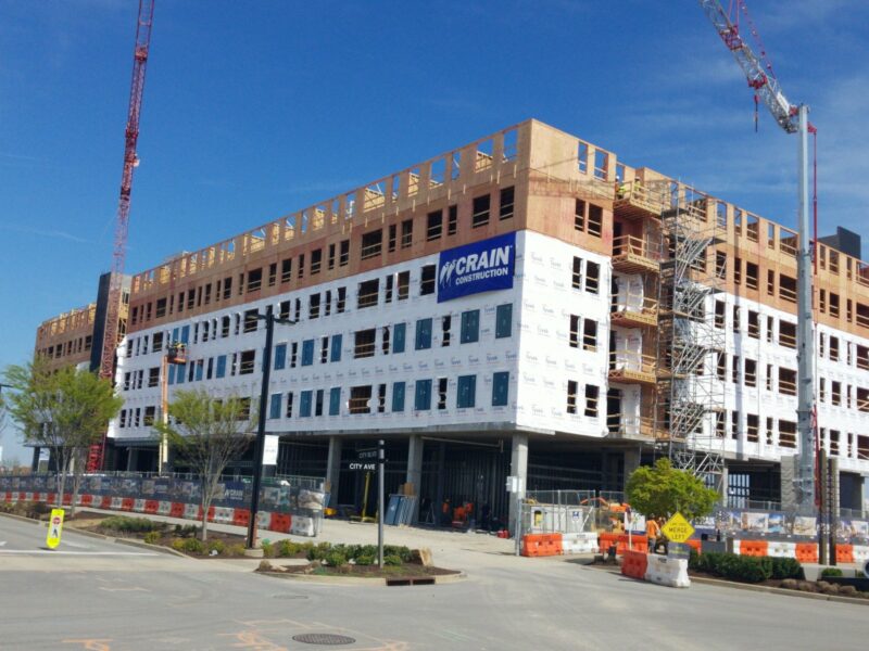 Element Onecity building under construction with crains out front.