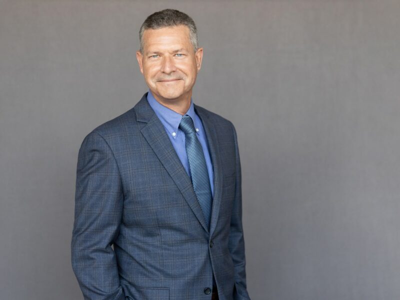 A professional portrait of Mike Gribble, VP at Crain Construction