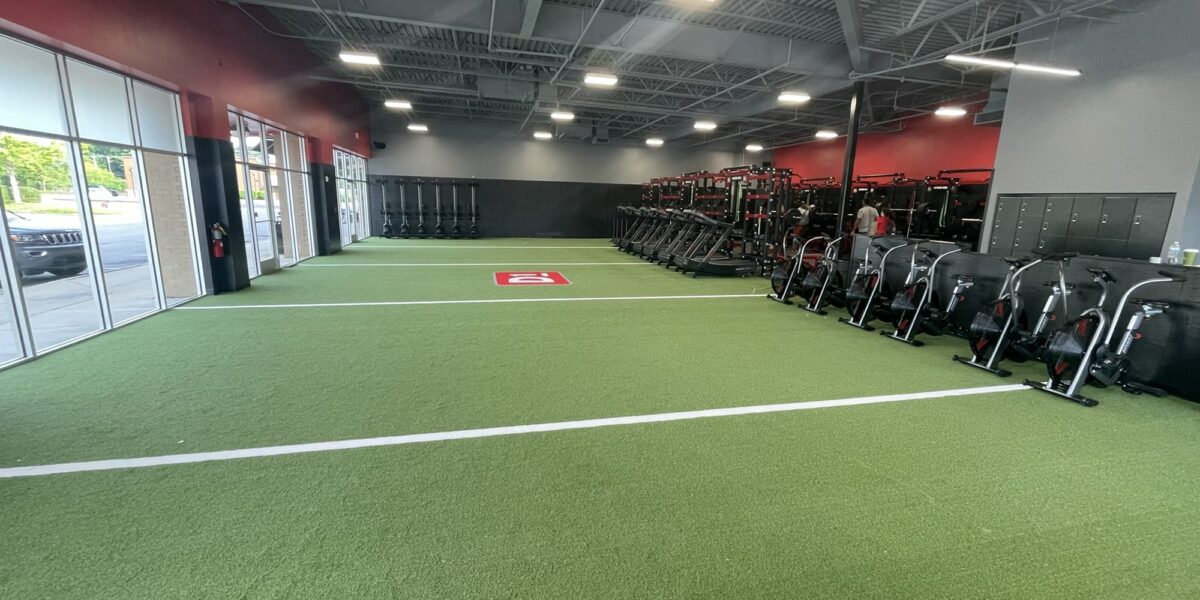 Wide shot of the turf field inside a D1 Training Facility in Spring Hill