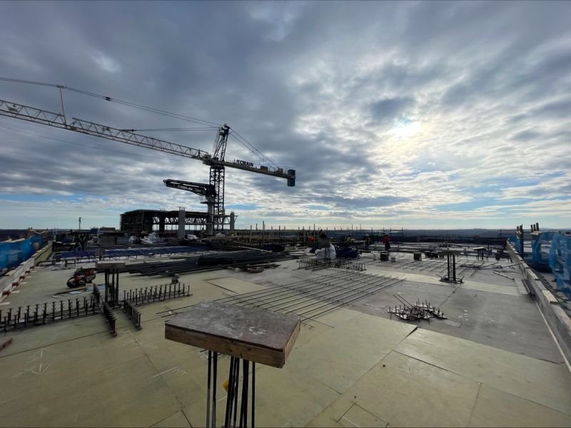 BNA Hilton pouring the rooftop pool deck on a cloudy day