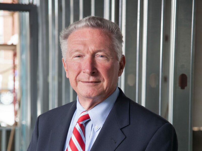 Lewis Rankina, a Crain Construction past CEO, in a professional portrait.