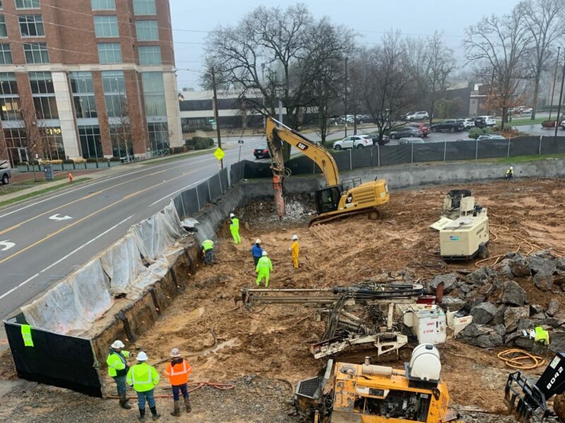 Construction workers busy doing dirt work at the Crestmoor site in Nashville