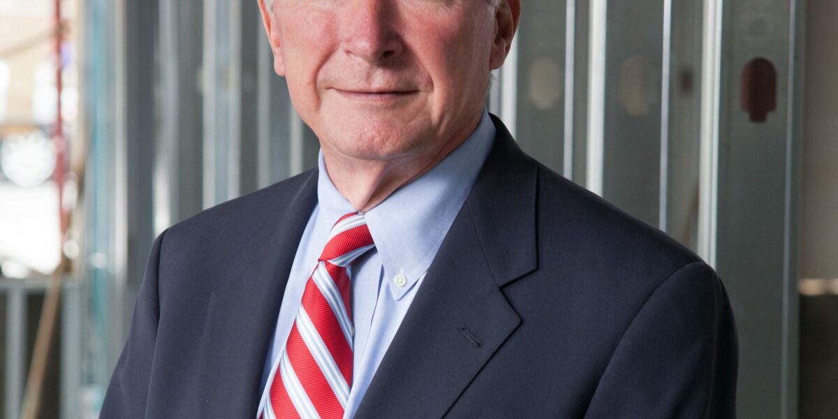 Lewis Rankina, a Crain Construction past CEO, in a professional portrait.