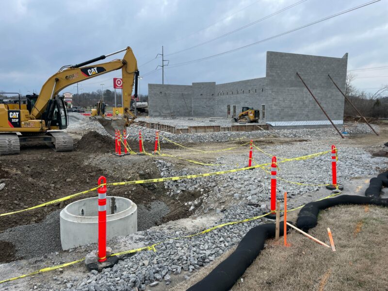Nashville construction site roped off with orange cones and caution tape.
