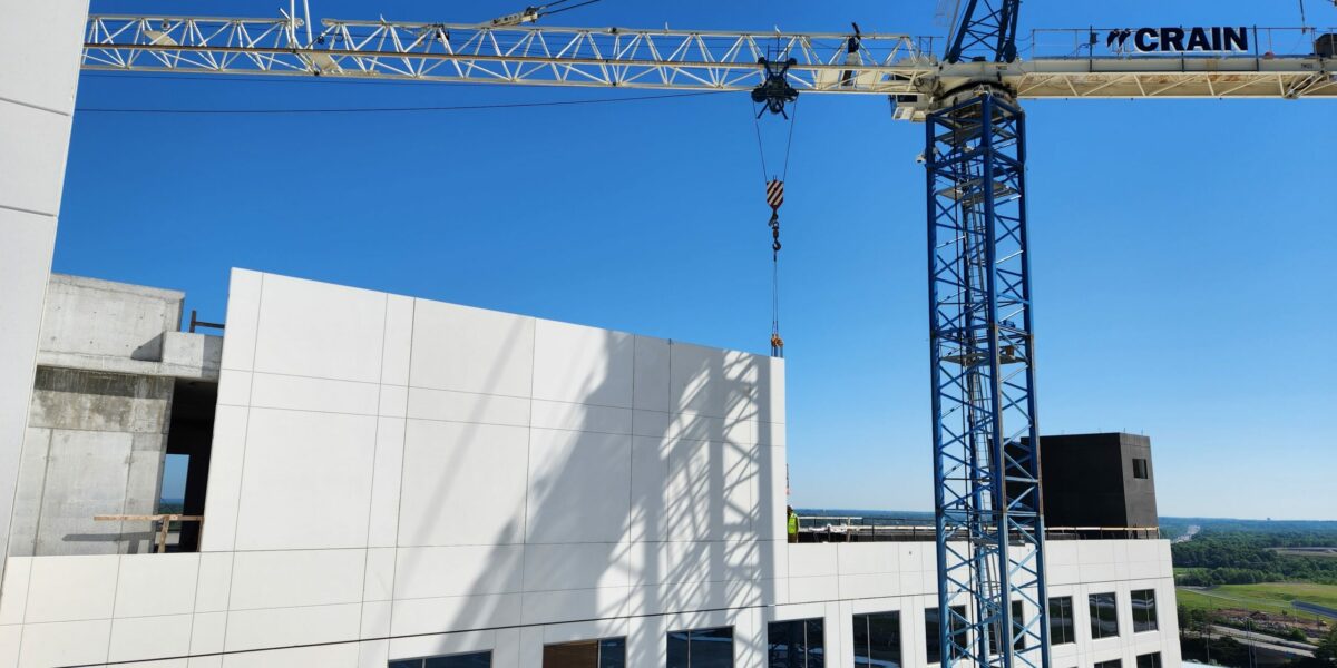 Crane Construction logo on a Crain that is being used on a high rise building in Nashville, Tennessees