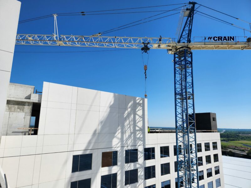 Crane Construction logo on a Crain that is being used on a high rise building in Nashville, Tennessees