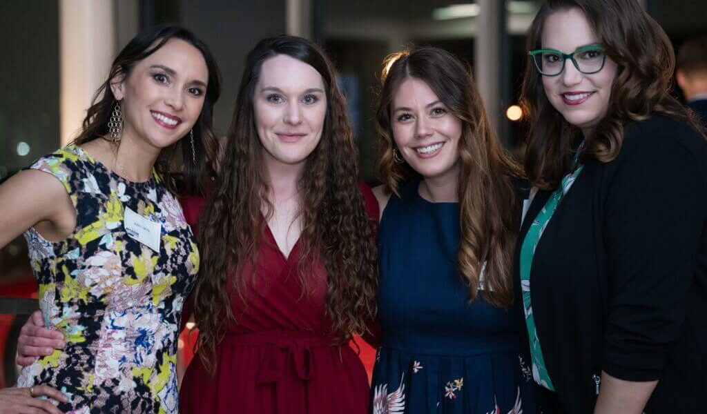 Crain Construction Employees Celebrating 90th Anniversary in Evening Wear